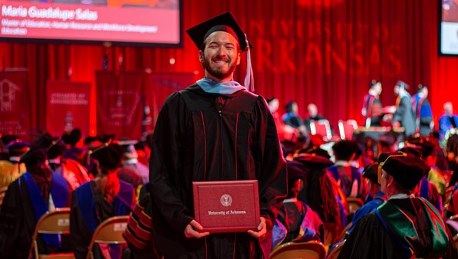 A U of A graduate student at graduation