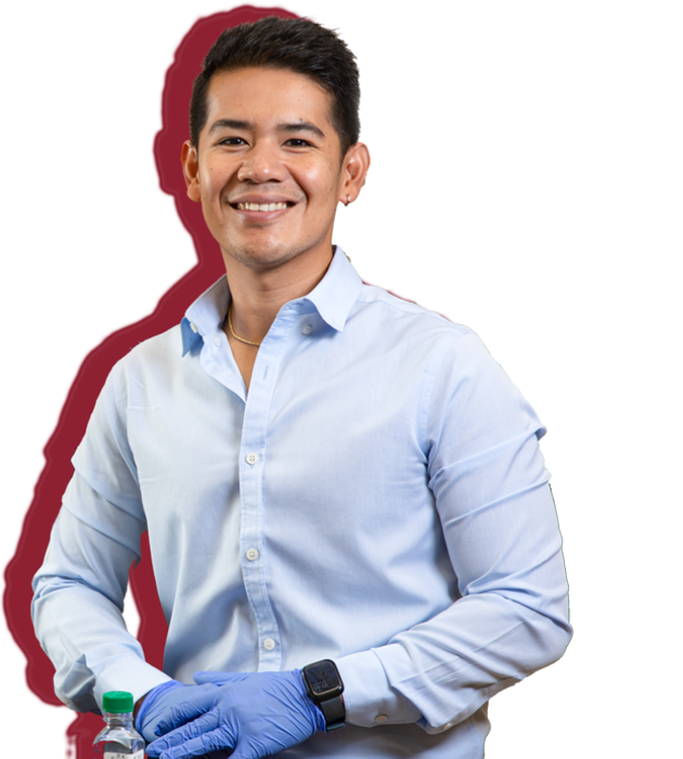 Graduate student in a lab at the University of Arkansas